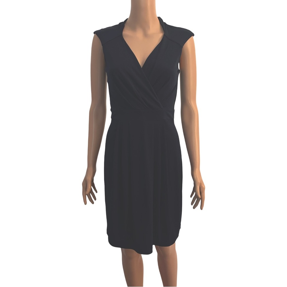 Dark navy dress by Enfocus Studio.